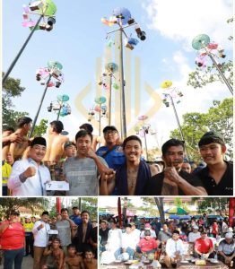 Peringatan HUT Tanjabbar Ke 59, Bupati Anwar Sadat Gelar Perlombaan Panjat Pinang